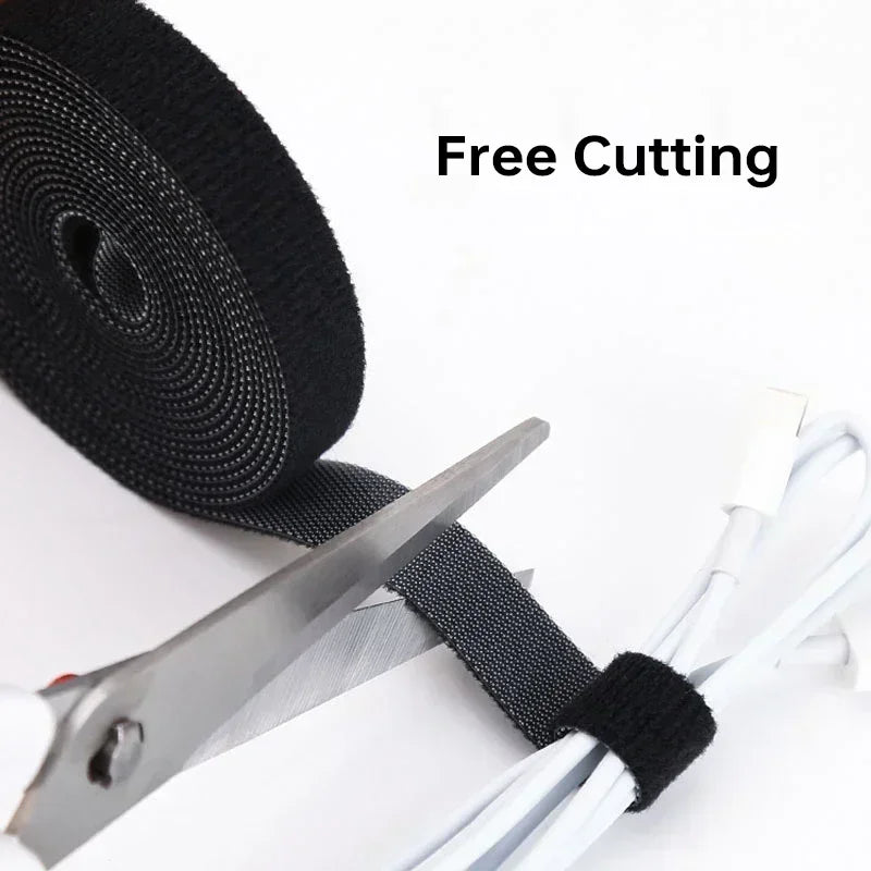 Black webbing strip with scissors on a white background, labeled 'Free Cutting'.