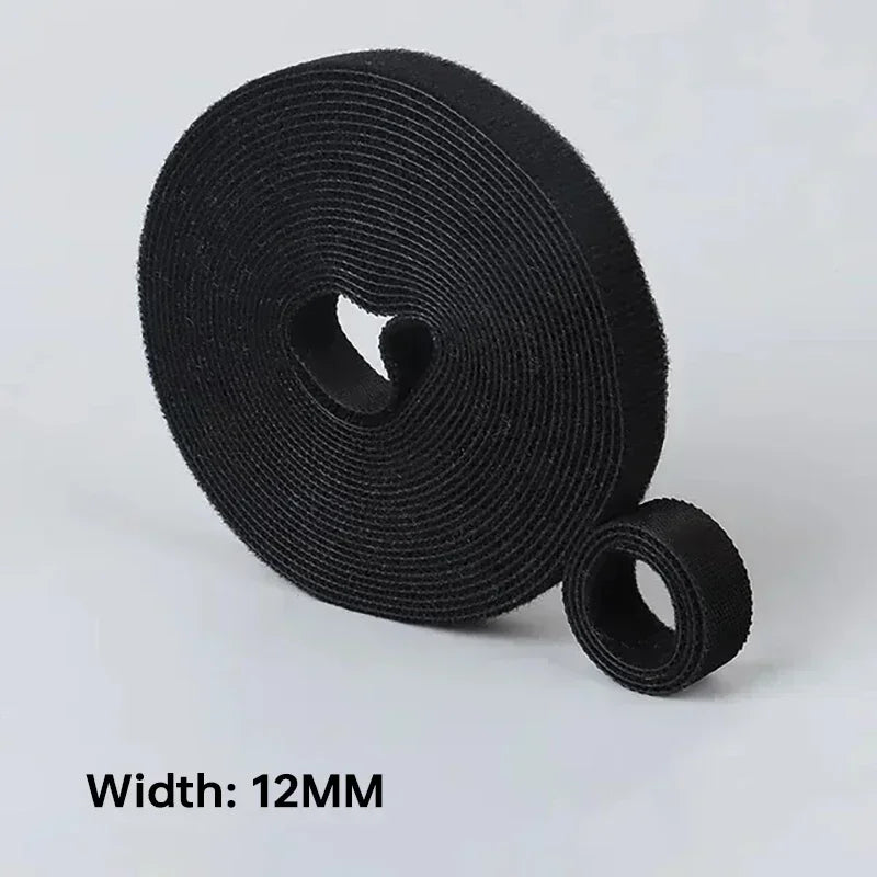 Roll of black cable tie with a width of 12MM on a light gray background