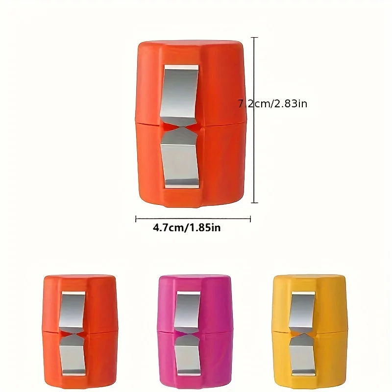 Three small containers in orange, pink, and yellow with a silver clip on a white background.